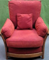 Ercol mid 20th century oak spindle back country style armchair. Approx. 97 x 90 x 79cms Ercol mid