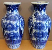 Pair of late 19th century Oriental blue and white glazed ceramic vases. Approx. 30cms H reasonable