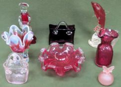 Quantity of cranberry and ruby coloured glass figures, vases, bowl etc all used and unchecked