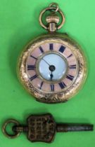 Pretty 9k gold half hunter pocket watch with enamelled decoration used condition not tested crack to