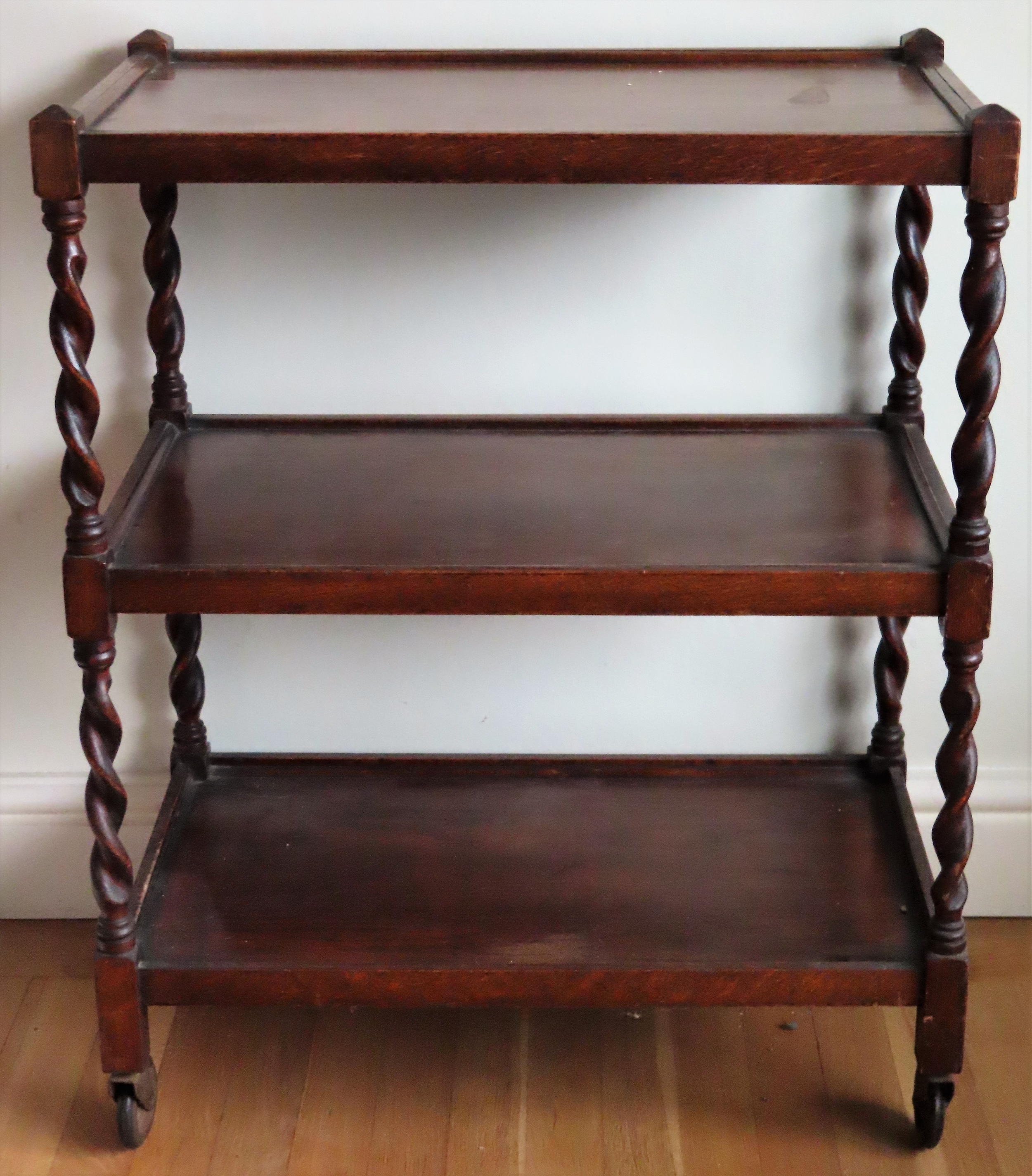 20th century oak three tier barley twist tea trolley. Approx. 86 x 68 x 40cms reasonable used