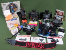 Quantity of various cameras and accessories, etc all used and unchecked