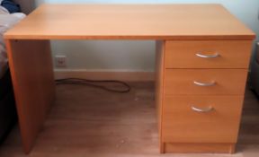 20th century light oak three drawer writing desk. Approx. 73 x 121 x 65cms reasonable used condition