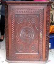 19th century carved fronted oak wall mounting corner cupboard. Approx. 103 x 82 x 47cms