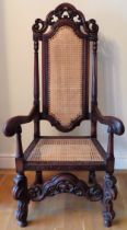 Victorian mahogany craved begere seated and backed throne/armchair. Approx. 145 x 73 x 47cms