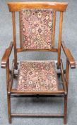 Late 19th / early 20th century small mahogany folding campaign chair. Approx. 80cms H x 53cms W x