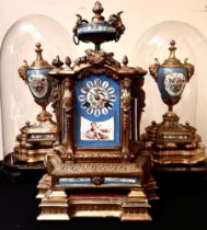 FRENCH GILDED CLOCK AND GARNITURES WITH ENAMEL PANELS DEPICTING CHERUBS, BIRDS AND FLORAL SPRAYS,