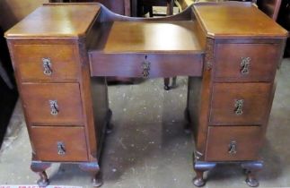 Art Deco oak seven drawer desk. Approx. 79cm H x 107.5cm W x 47cm D Reasonable used condition,