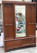 Oak single door mirrored wardrobe. Approx. 200cm H x 145cm W x 49cm D Used condition, scuffs and