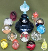 Parcel of various coloured glass paperweight including Pfeiffer etc All in used condition, unchecked