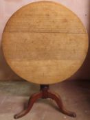 Early 20th century oak tilt top circular table, on tripod supports. Approx. 78cms H x 86cms D used