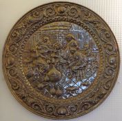 Vintage repousse decorated large circular wall plaque. Approx. 63cms D reasonable used condition