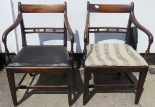 Pair of oak armchairs Both in used condition, arms slightly loose, scuffs and scratches, splits,