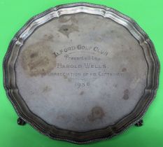 Hallmarked silver wave edged salver on raised supports, Birmingham assay, dated 1937