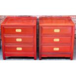 Pair of 20th century Chinese hardwood three drawer chests with campaign style handles. Approx. 56