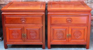 Pair of 20th century Chinese hardwood two door, single drawer chests. Approx. 56 x 56 x 56cms