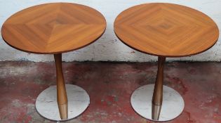 Pair of stylish mid 20th century teak topped weighted based circular side tables. Approx. 50 x 50cms