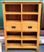 20th centiury light oak open bookcase with two central drawers. Approx. 141 x 100 x 36cms reasonable