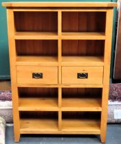 20th centiury light oak open bookcase with two central drawers. Approx. 141 x 100 x 36cms reasonable