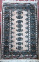 Pakistan floor rug. Approx. 122 x 76cms used with minor wear etc