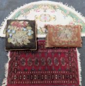 Two vintage floor rugs, plus two old cushions All in used condition, unchecked