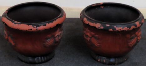 Pair of pottery jardinières, with relief lion head decoration. Approx. 30 x 40cms D used with