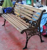 Victorian cast iron slatted garden bench. Approx. 72 x 125 x 45cms used with wear damage etc