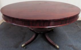 19th century mahogany circular tilt top breakfast table on quadrofoil supports. Approx. 73 x