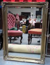 20th century gilt framed bevelled wall mirror. App. 107 x 76cm Reasonable used condition