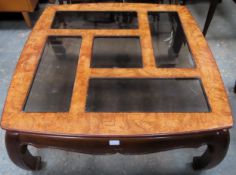 20th century wooden framed coffee table with glass inserts. Approx. 45 x 97 x 97cms reasonable