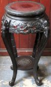 Heavily carved oriental hardwood two tier plant stand. Approx. 76cms H x 41cms D reasonable used