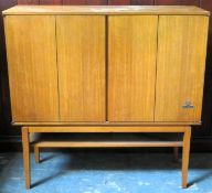 Grundig mid 20th century teak two door record cabinet. Approx. 83.5cms H x 85cms w x 23cms D