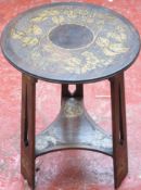 Arts and Crafts style mahogany circular occasional table, with poker work style carved grape and