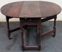 19th century drop leaf Pembroke table with single drawer. Approx. 72cm H x 115cm W x 94cm D