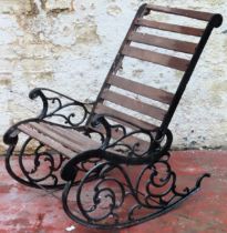19th century painted cast iron slatted garden rocking chair. Approx. 95 x 61 x 87cms used wear minor