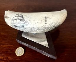 PIECE OF SCRIMSHAW SAILING SHIP INSCRIBED UPON A WHALE'S TOOTH, PROBABLY MID 20th CENTURY