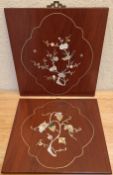 PAIR OF WOODEN MOTHER OF PEARL DECORATED PANELS. APPROX. 28 X 28CM