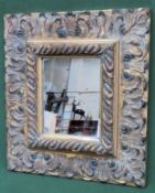 Pretty ornately gilded wall mirror. Frame Approx. 52cms x 47cms reasonable used with scuffs and