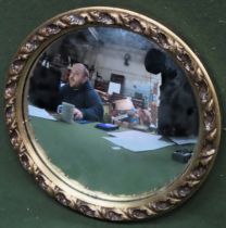 Small circular gilded wall mirror. Approx. 24.5cms D