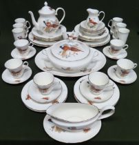 Quantity of transfer decorated fine bone china dinner set depicting pheasants in flight. Approx. 40+