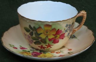 Royal Worcester blush ivory hand painted tea cup and saucer, with floral sprays appears reasonable