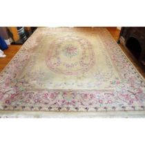 Large Chinese style floral decorated floor rug. Approx. 362 x 279cms