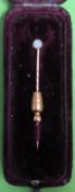 Victorian gold coloured tie pin, set with small opal stone reasonable used