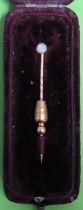Victorian gold coloured tie pin, set with small opal stone reasonable used