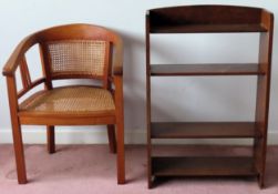 Bergere backed single armchair, plus small set of mahogany open bookshelves