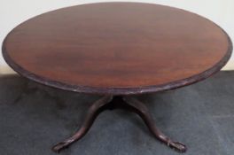 Large early 20th century carved mahogany circular tilt top breakfast table on tripod supports