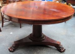 19th century Rosewood tilt top circular topped breakfast table on tripod and oversized claw support