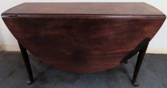 19th century mahogany drop leaf dining table on cabriole supports. Approx. 71 x 122 x 137cms
