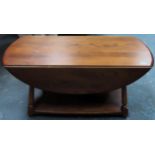 Ercol 20th century oak drop leaf coffee table. Approx. 48cm H x 107cm x 90cm