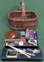 Basket containing various sundry items including silver and other spoons, Rathbone's measuring tape